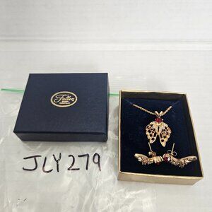 FULLER BRUSH COMPANY GOLD TONED RED STONE WINGED PENDANT NECKLACE AND EARRINGS